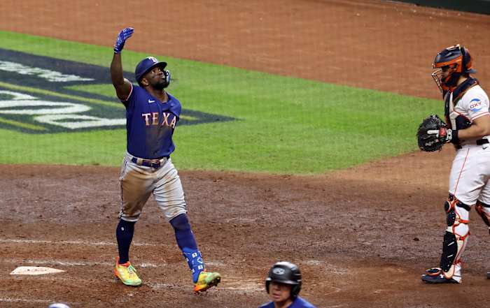 Texas Rangers right fielder Adolis Garcia celebrates after hitting a home run during the eighth inning of Game 7 of the ALCS against the Houston Astros on Oct. 23 at Minute Maid Park.